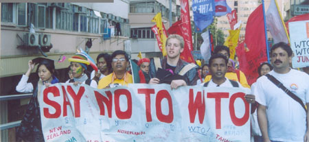 Students under the banner of ASA marching against WTO in Hong Kong