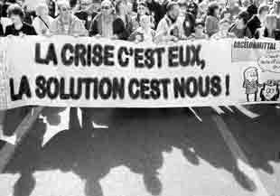 French Slogan : 'The crisis, it's you, the solution, it's us'